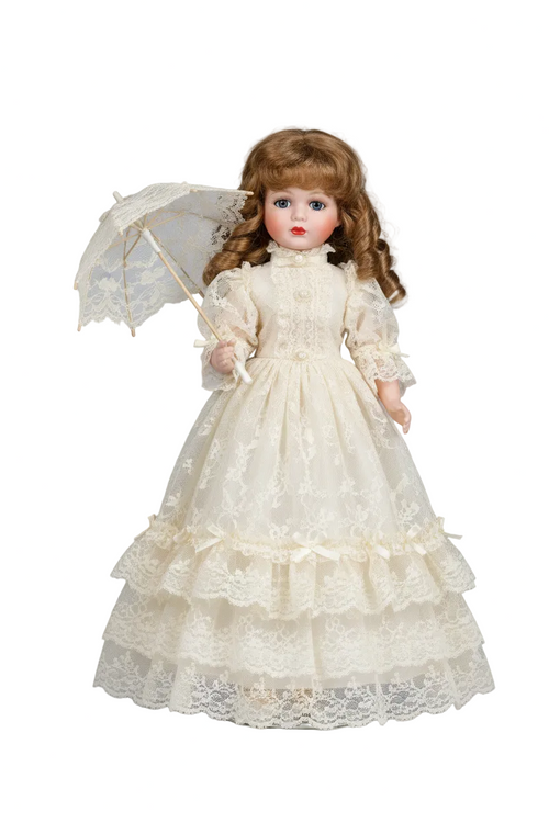 Collectible porcelain-style doll with curly hair and lace dress on gray background with shadow